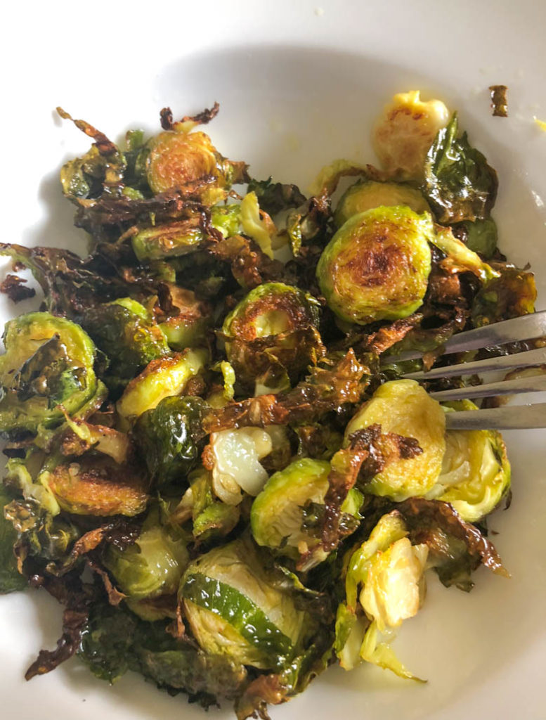 Roasted Brussels Sprouts in a white bowl