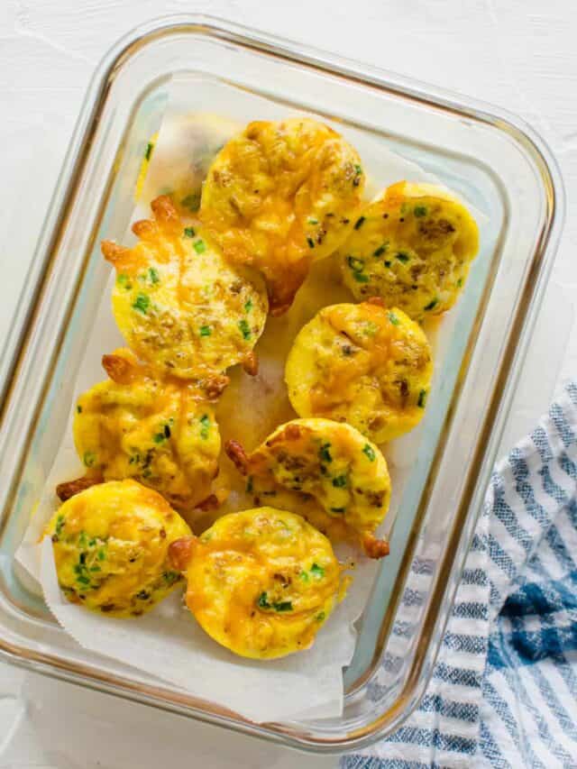 Cheddar Chive Egg Bites in a freezer storage container.
