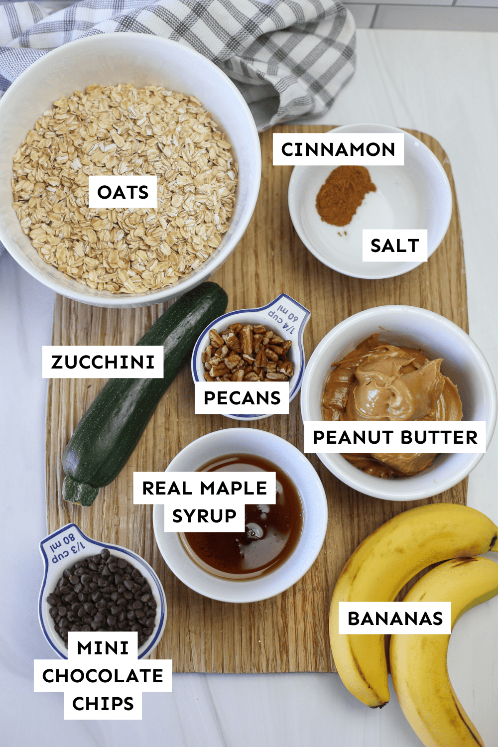 Ingredients measured out and labeled for zucchini breakfast cookies.