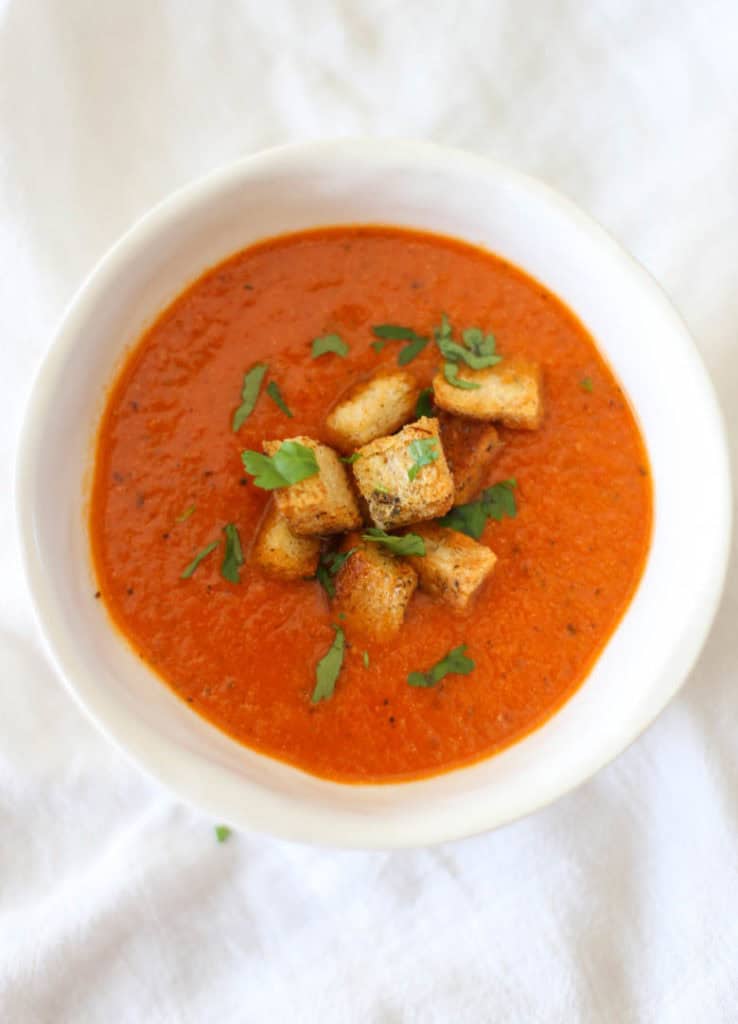 Instant Pot tomato soup in a white bowl