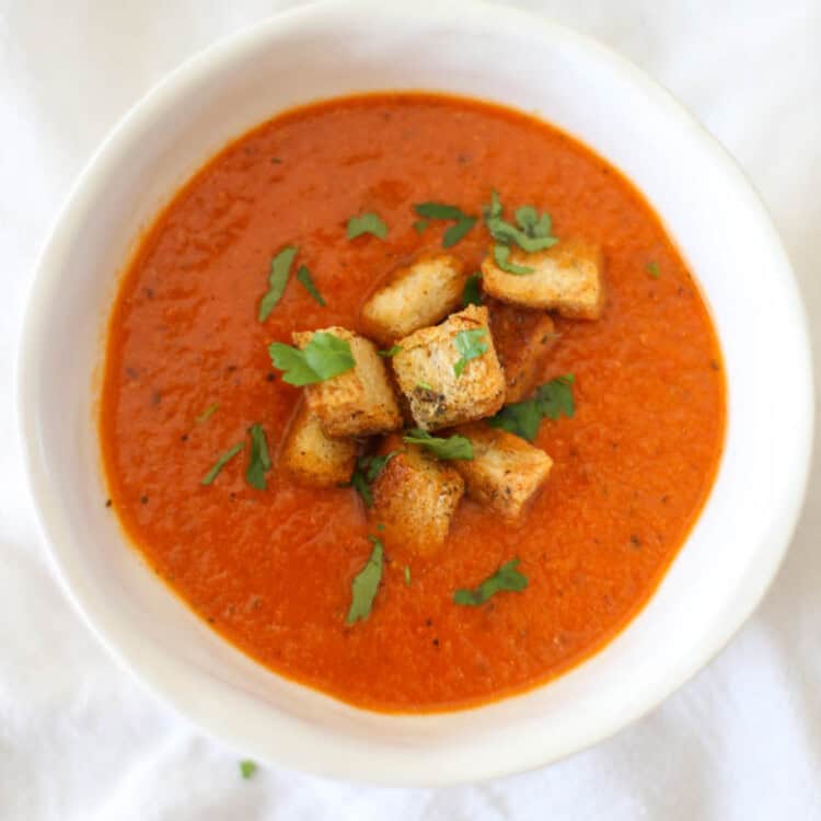 Instant Pot tomato soup in a white bowl