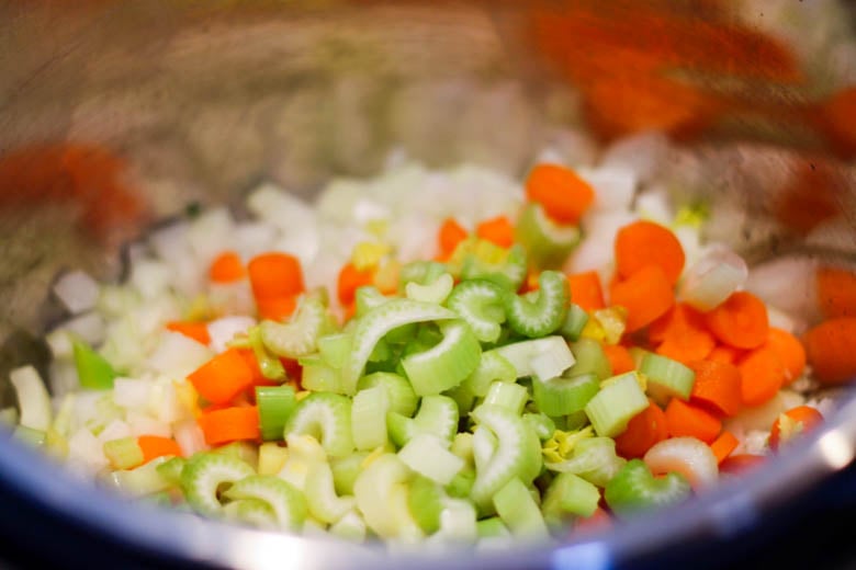 Vegetables sauteeing in the Instant Pot for Vegetable Soup