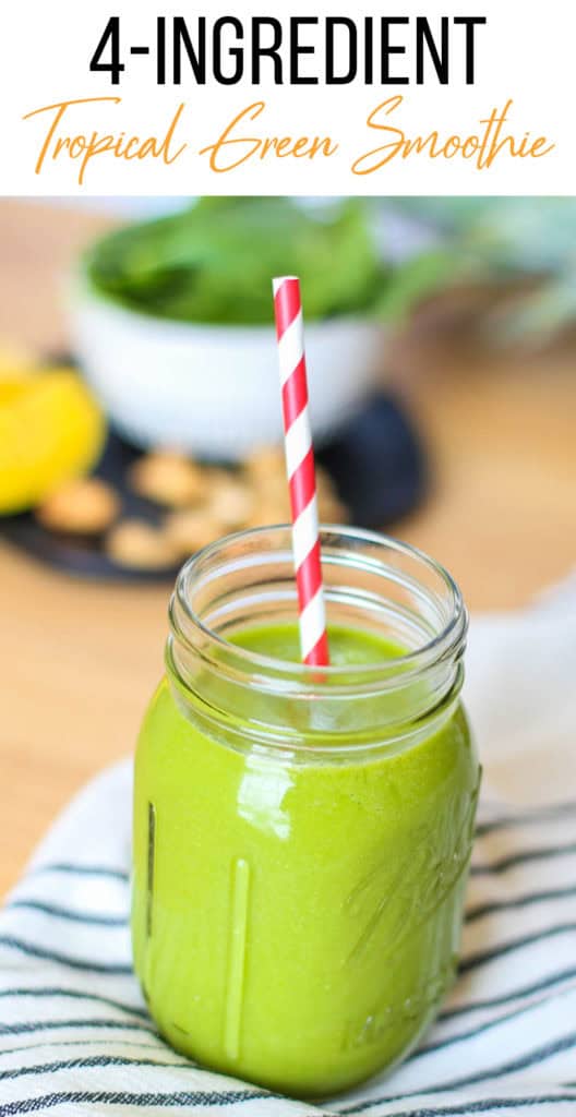 4-ingredient tropical smoothie in a mason jar. Red striped straw sticking out.