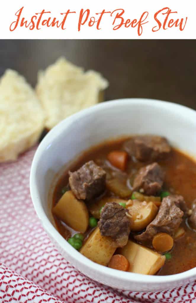 bowl of stew in white bowl with napkin