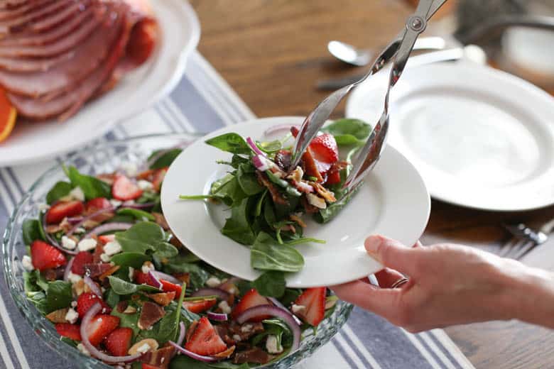 spinach salad on table