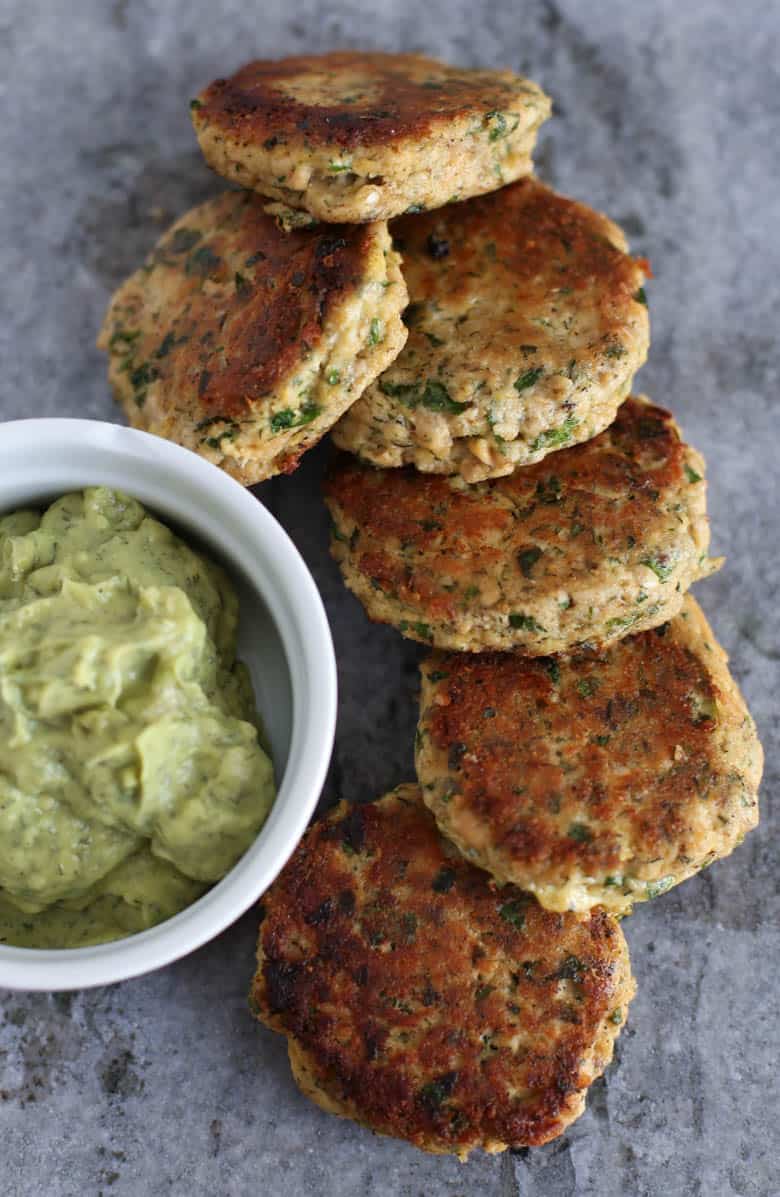 Salmon patties stacked up ready to serve.