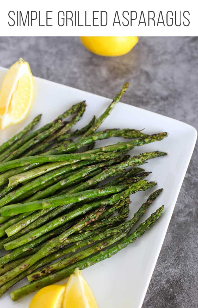 Grilled asparagus on a white plate