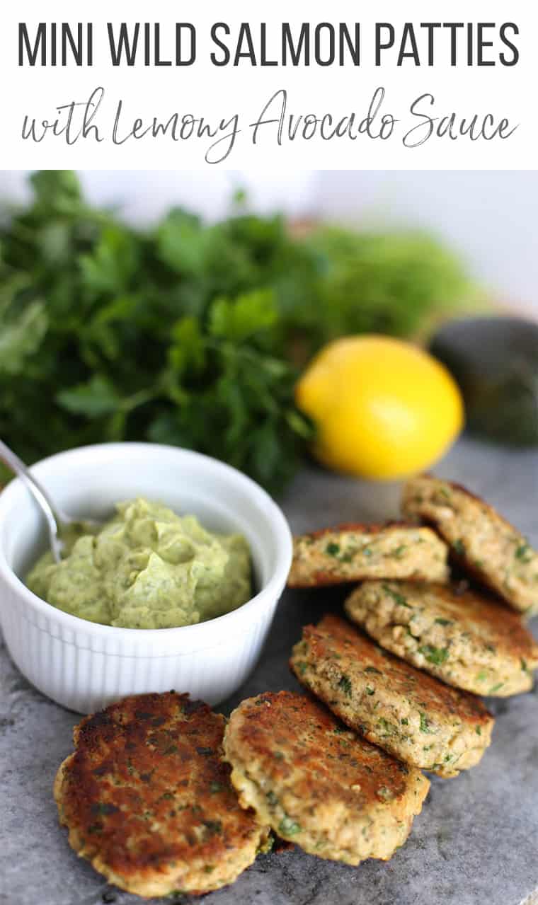 Salmon patties with lemony avocado sauce in a bowl.