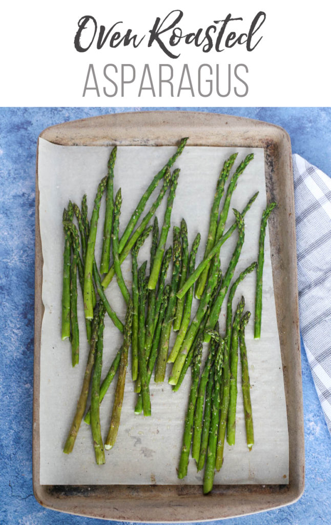 Oven roasted asparagus on a baking sheet
