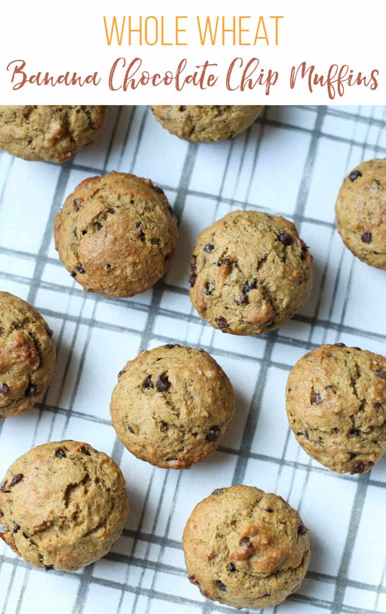 Chocolate chip banana muffins on a tea towel.