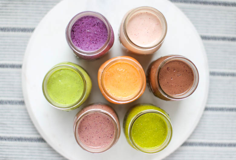 multicolored smoothies on a table