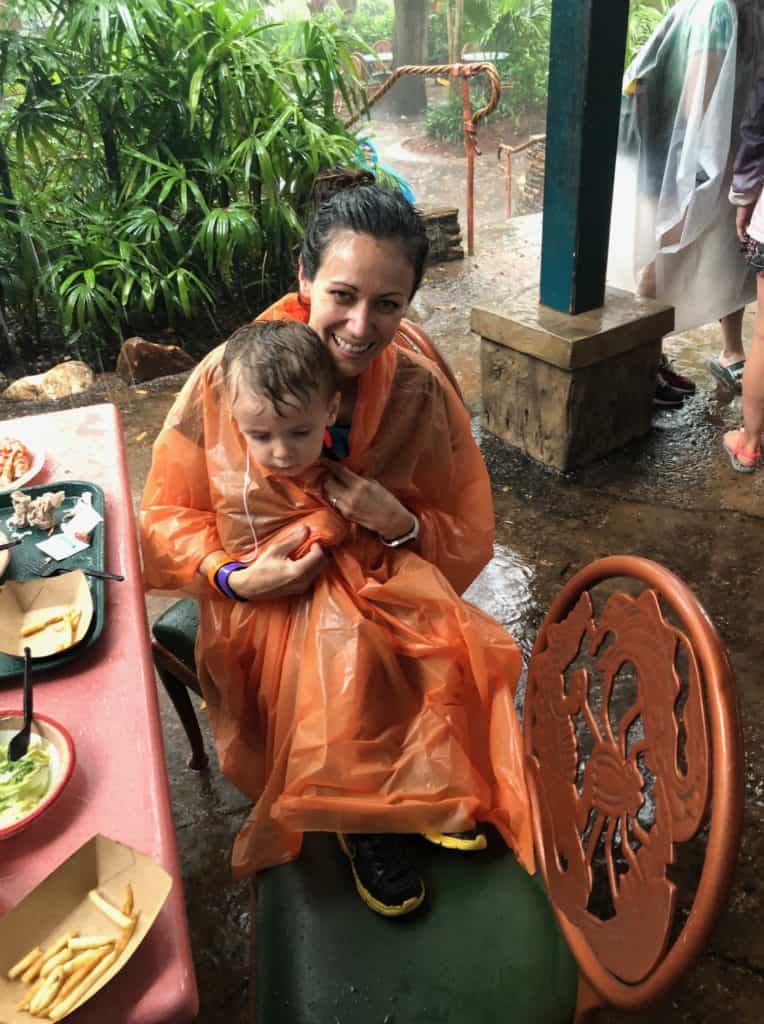 Mom and son in ponchos