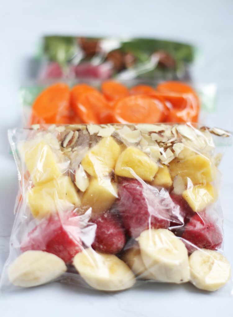 Ingredients for a smoothie layered in a freezer bag as a smoothie pack.