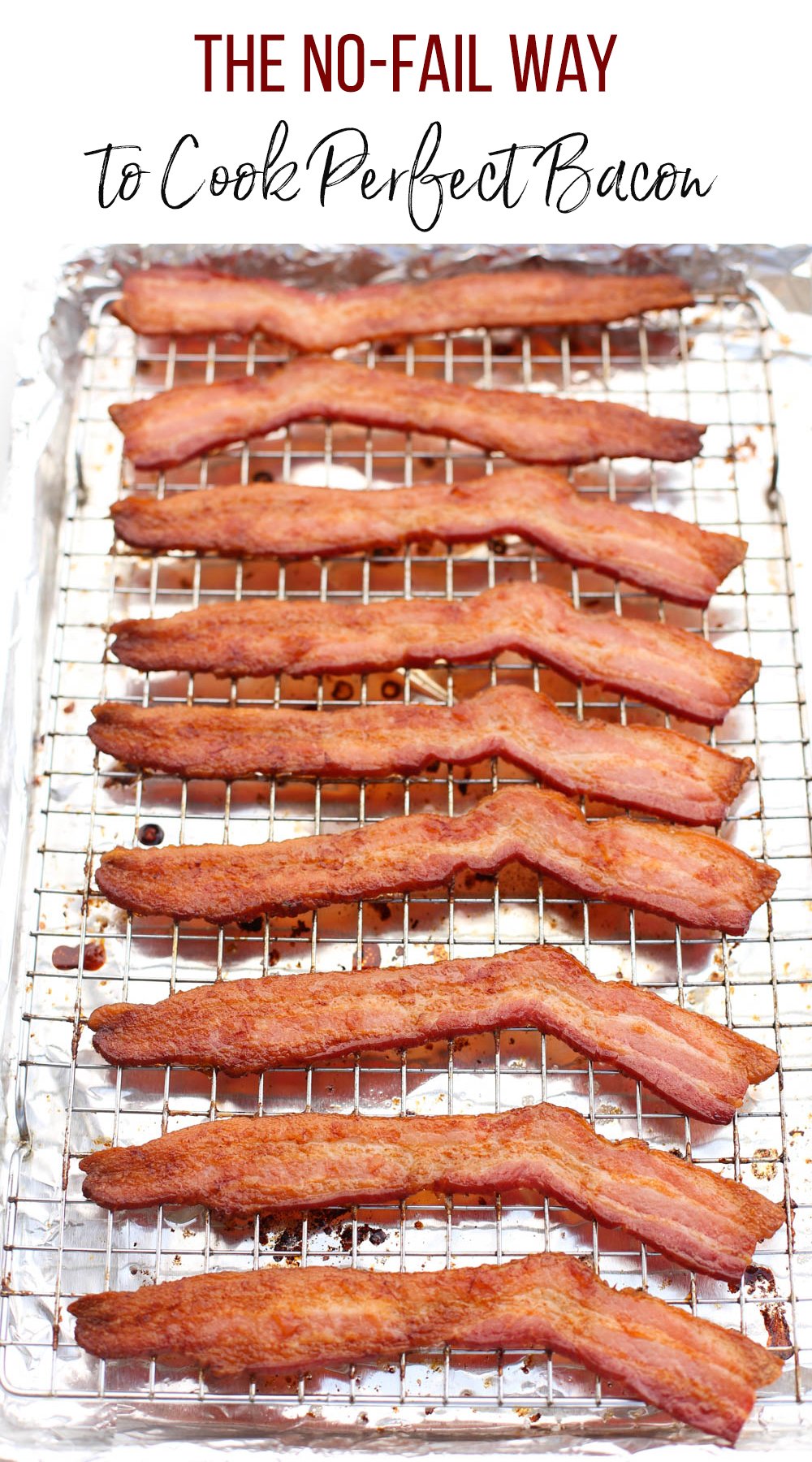 Cooked bacon on a baking rack sitting on top of a foil-lined baking sheet.