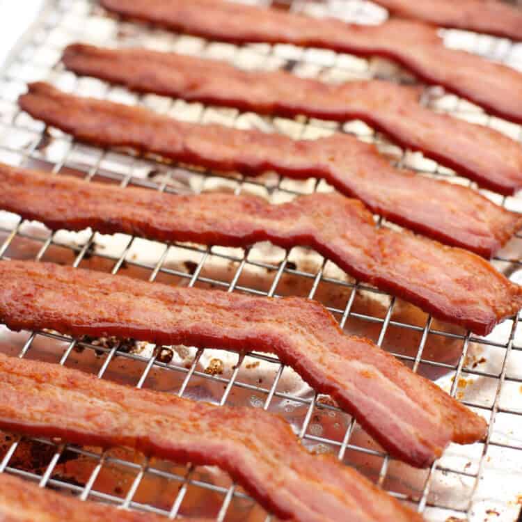 Bacon cooling on a baking rack.