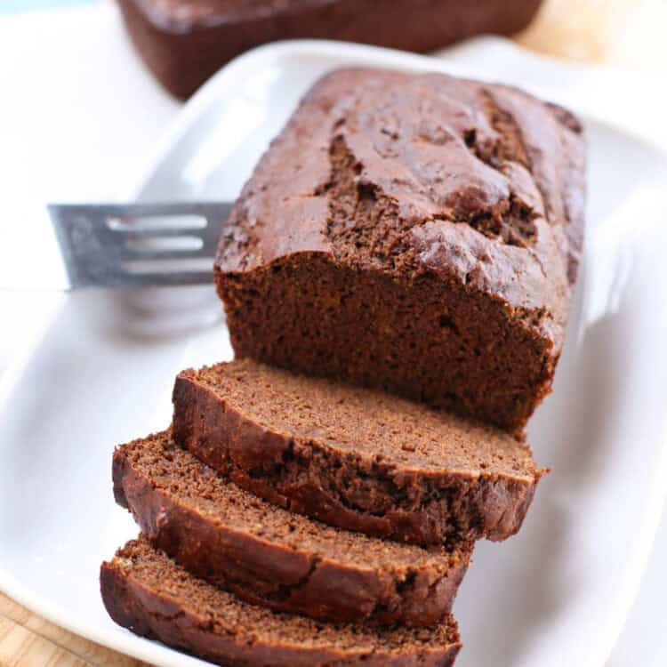 chocolate banana bread slices on white plate