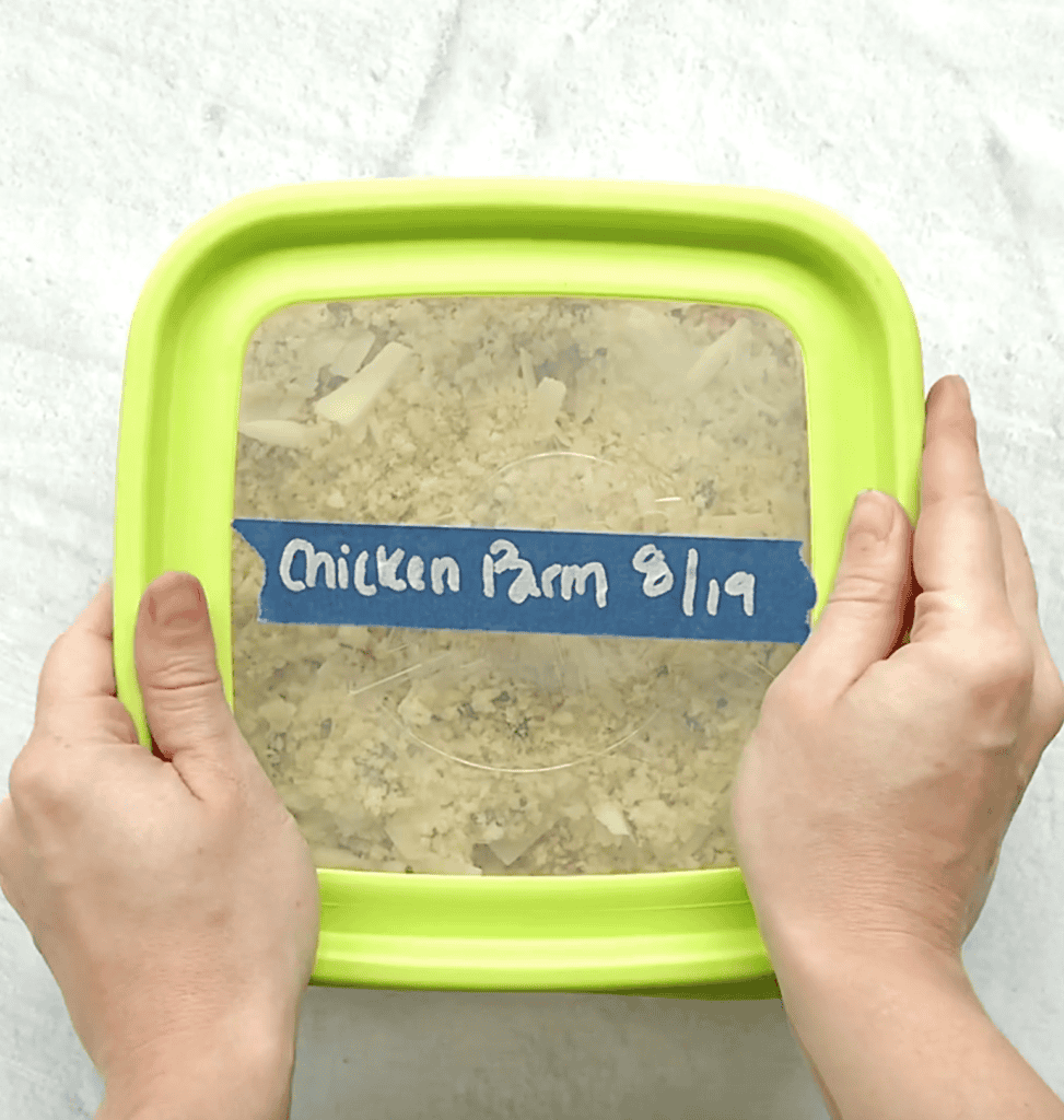 Chicken casserole in a freezer container.