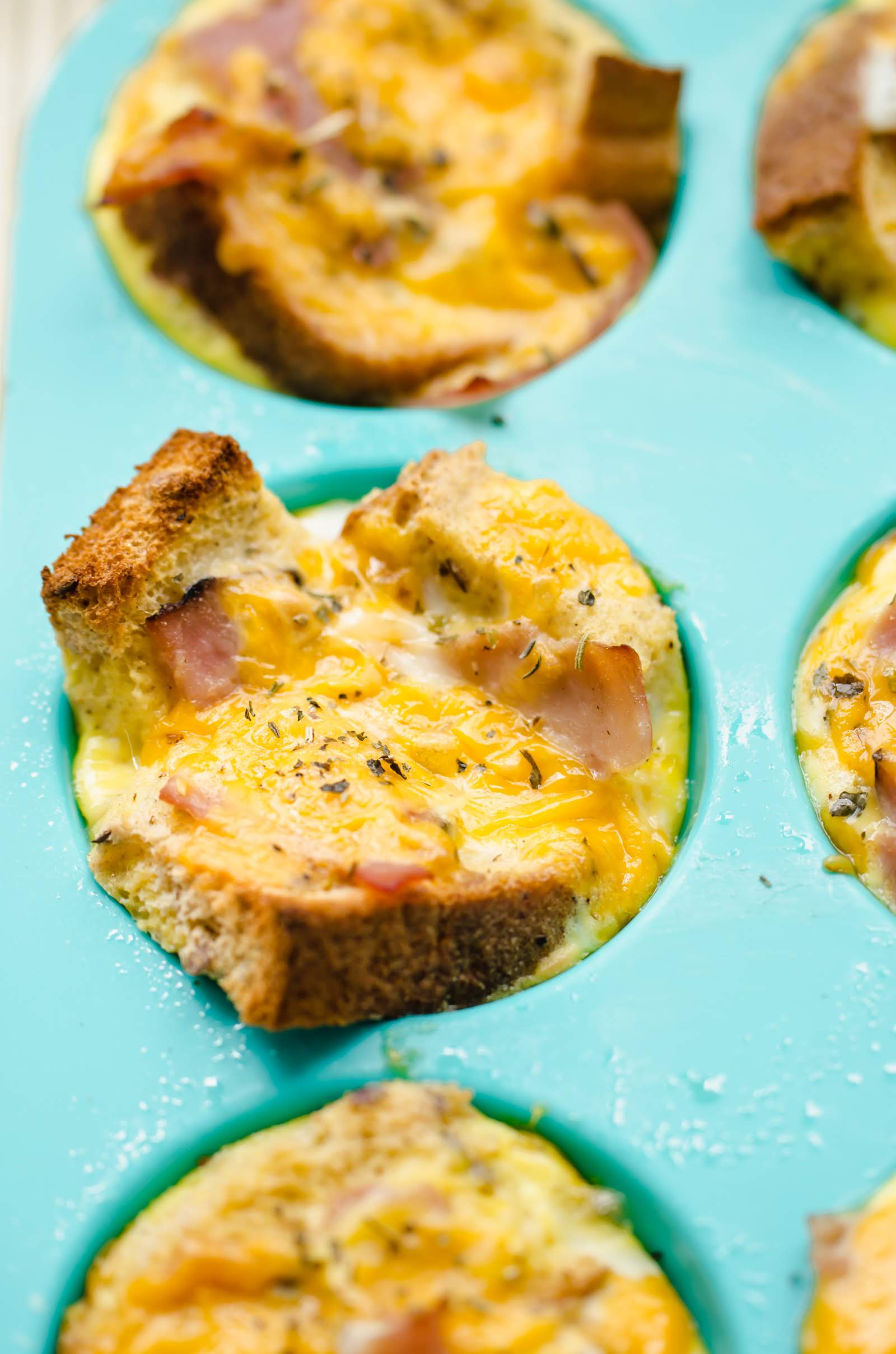 Breakfast egg muffins in a silicone muffin tin.