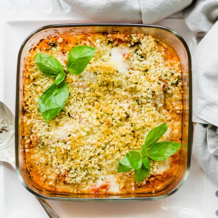 chicken parmesan casserole in a glass baking dish.