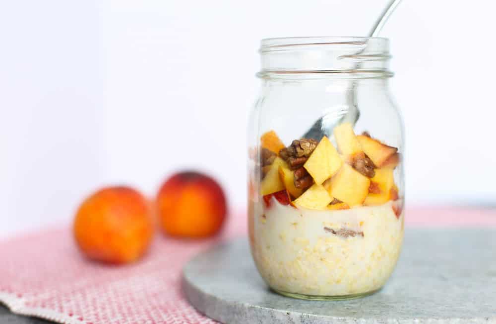 Nutty Peaches and Cream Overnight Oats in a Mason Jar