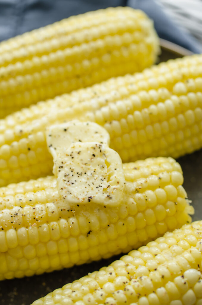 Microwaved corn on the cob with butter