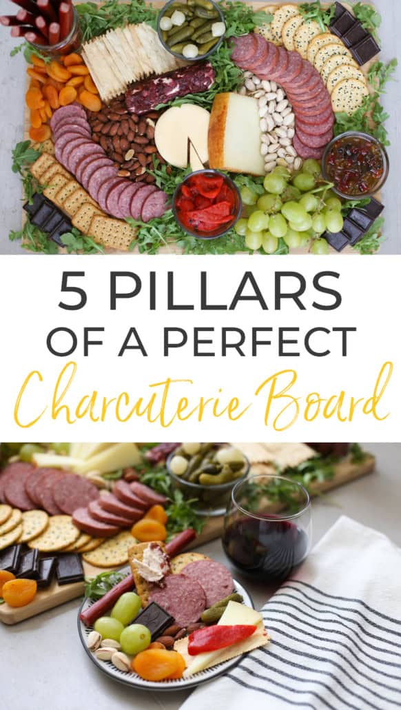 Charcuterie Board with Burgers' Smokehouse meat, cheese, crackers, grapes, apricots, pickles, roasted red peppers, pepper jelly, and dark chocolate.