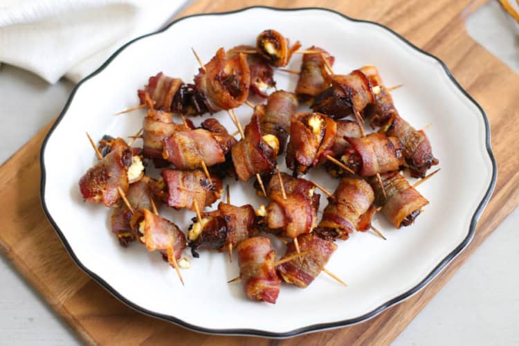 Bacon-Wrapped Dates with Goat Cheese on a plate