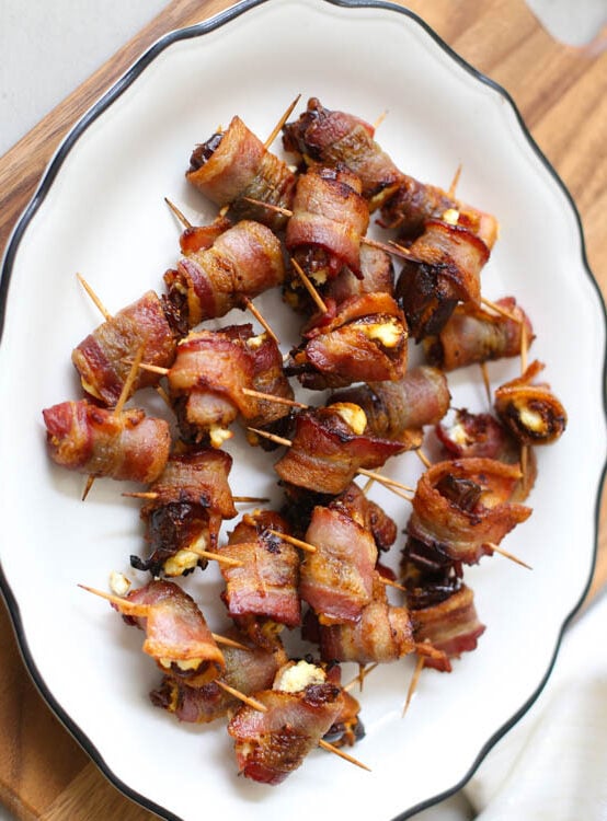 Bacon-Wrapped Dates with Goat Cheese on a plate