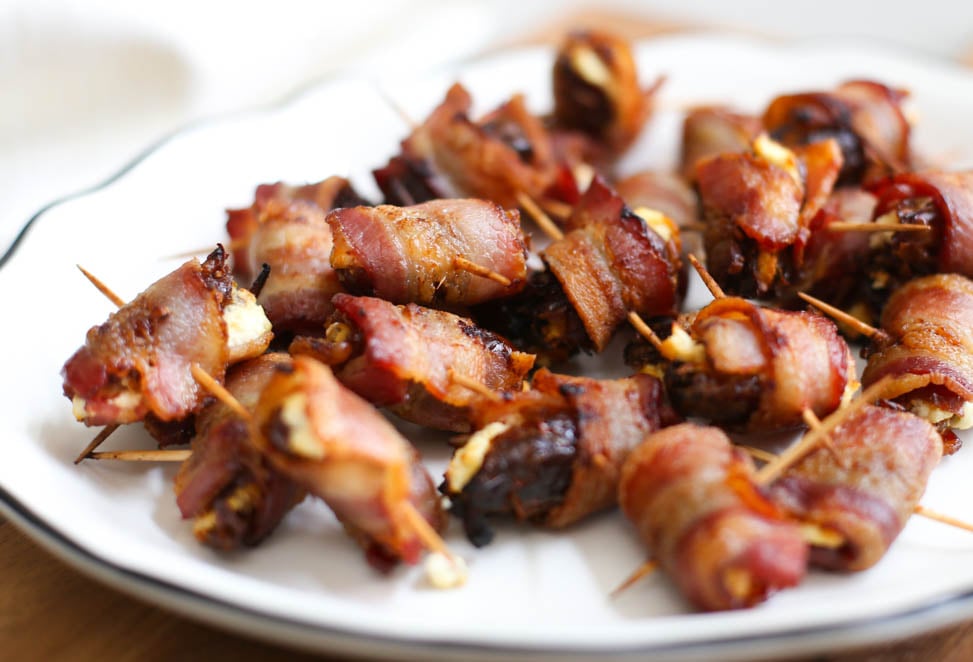 Bacon-Wrapped Dates with Goat Cheese on a plate