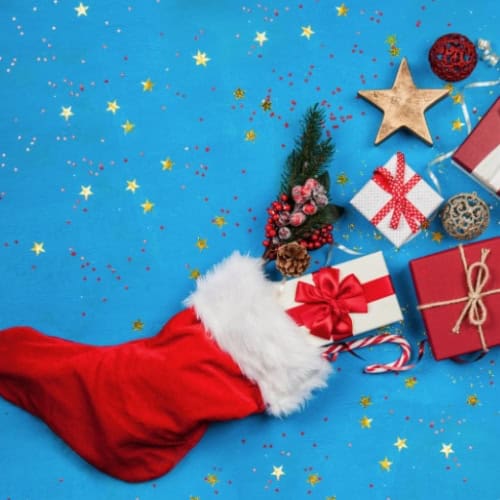 stocking with gifts coming out of the top
