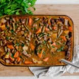 Finished easy beef stew cooked in a casserole dish.