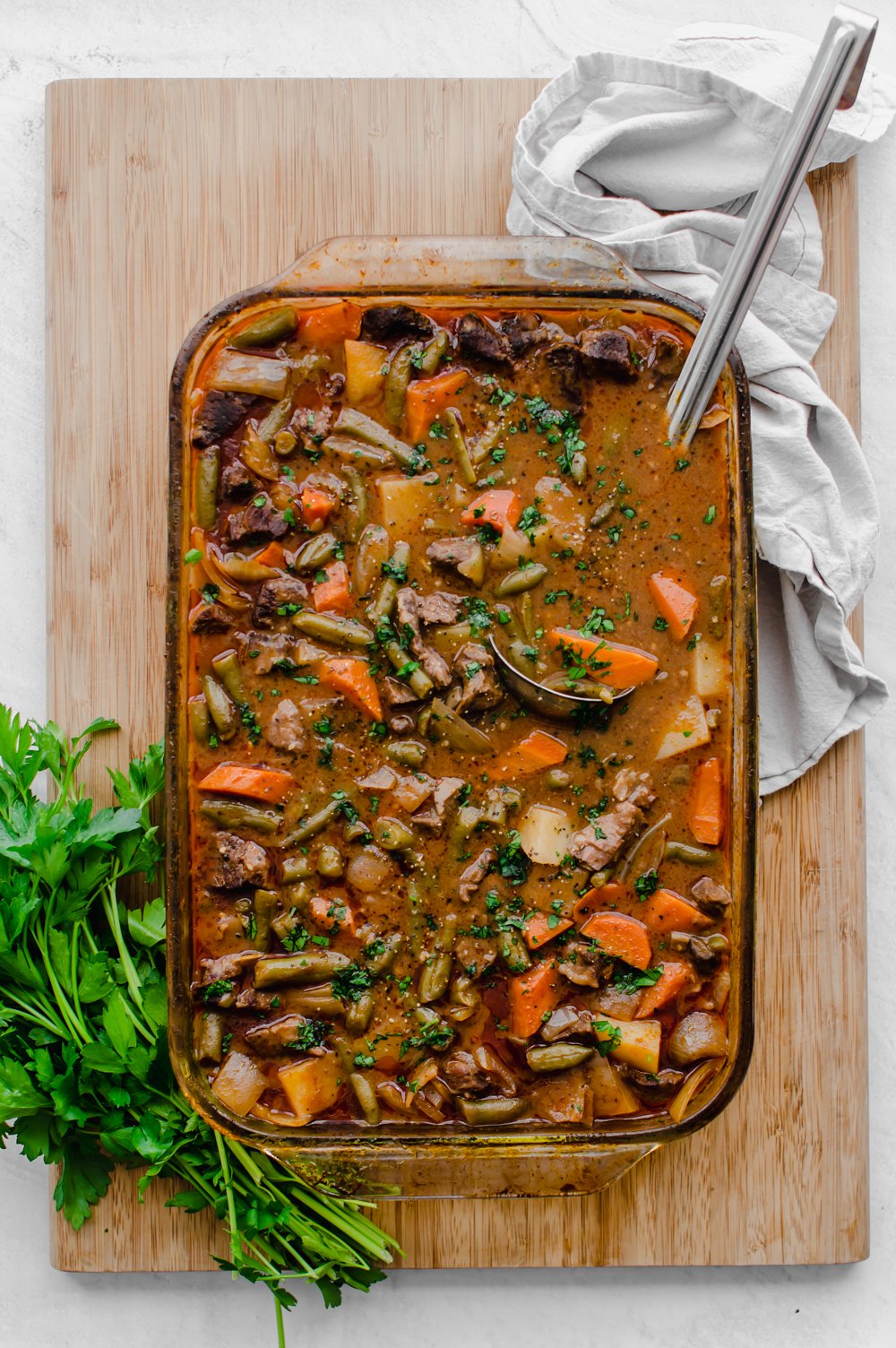 Finished easy beef stew cooked in a casserole dish.