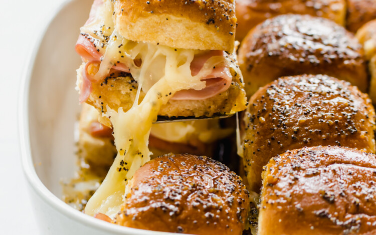 ham and cheese sliders being served.
