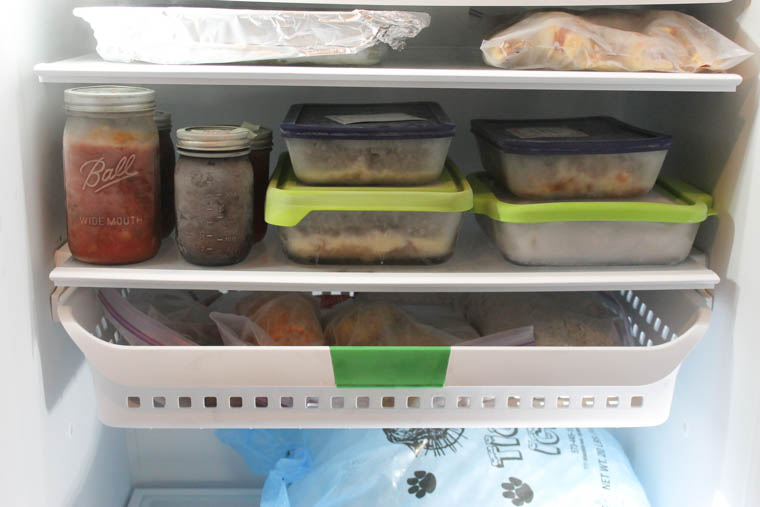 Freezer meals stacked in a freezer