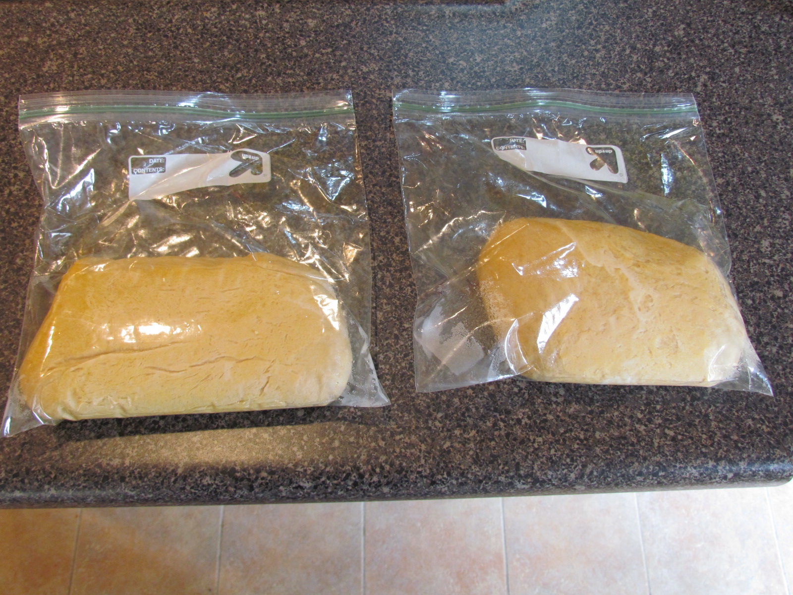 Homemade pizza dough in storage for the freezer