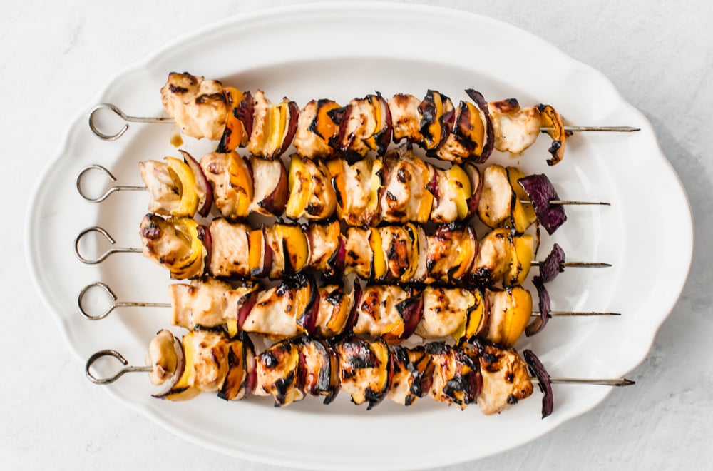 Grilled honey garlic chicken kabobs on skewers