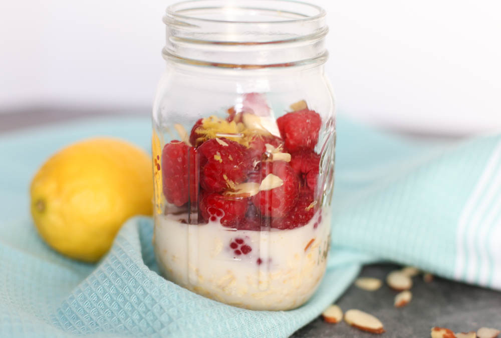milk, oats, raspberries, lemon zes in a mason jar