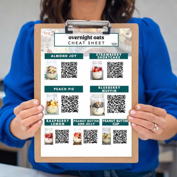 Hands holding overnight oats printable cheat sheet.