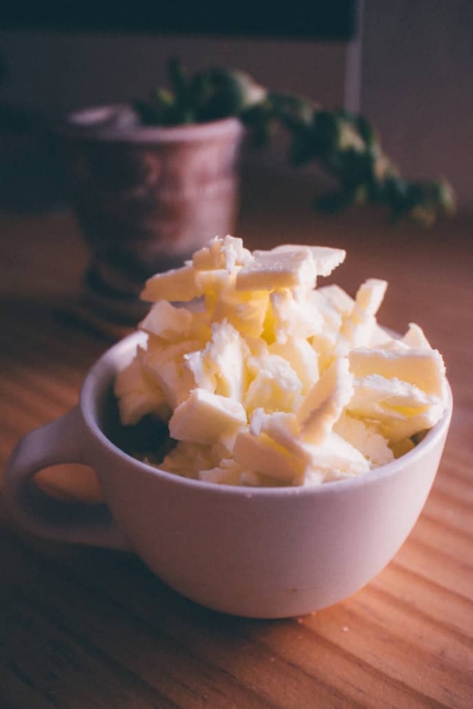 chunks of butter in a white ceramic bowl