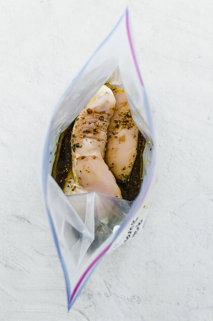 chicken breasts in freezer bag with balsamic chicken marinade