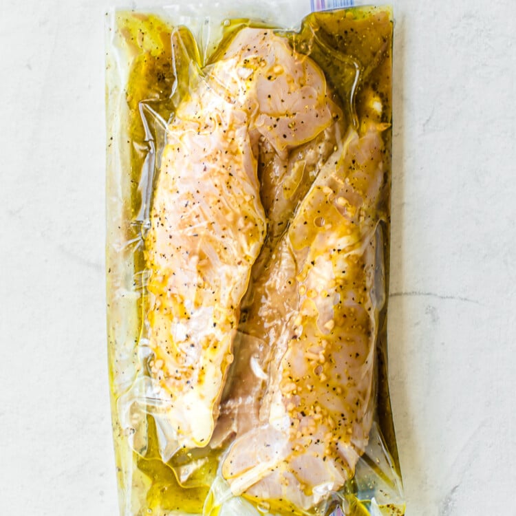 savory chicken marinade in savory chicken marinade in a freezer bag with chicken breasts