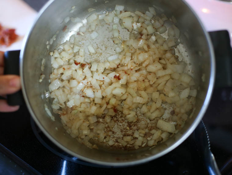 Sauteed onions in a pot