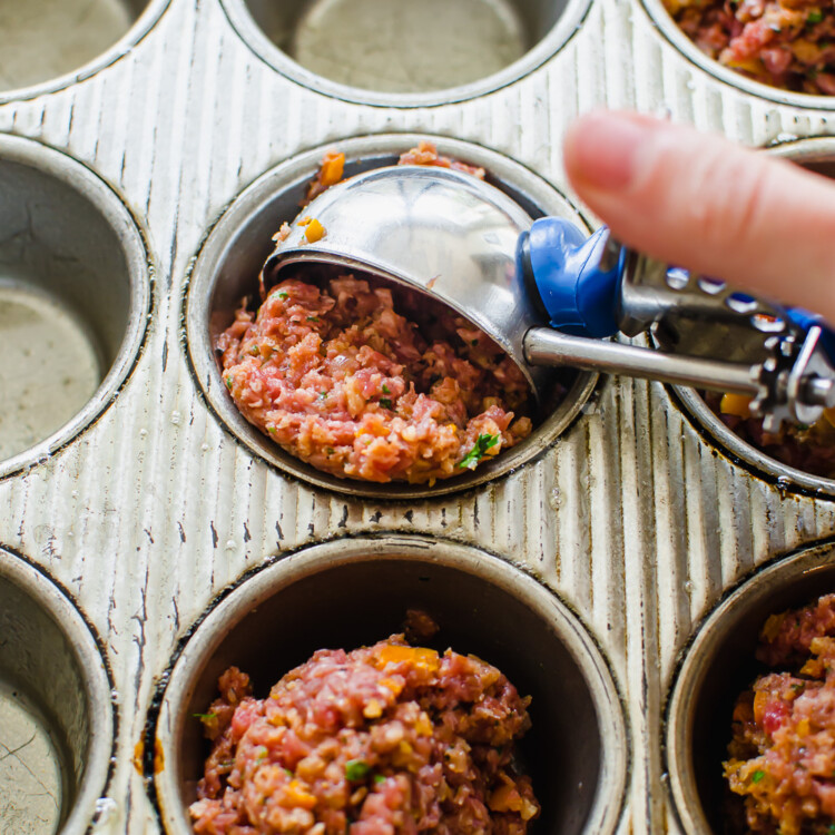 meatloaf mixture in a muffin tin