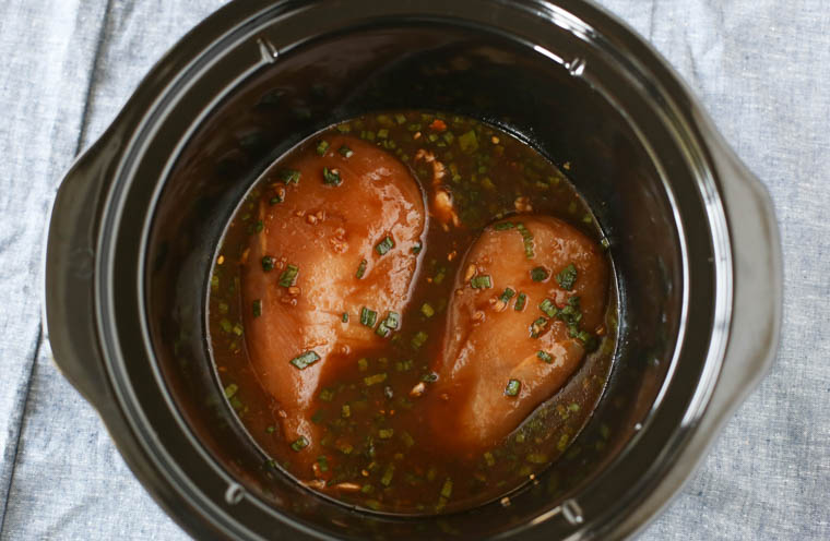 bourbon chicken and sauce in a crock pot