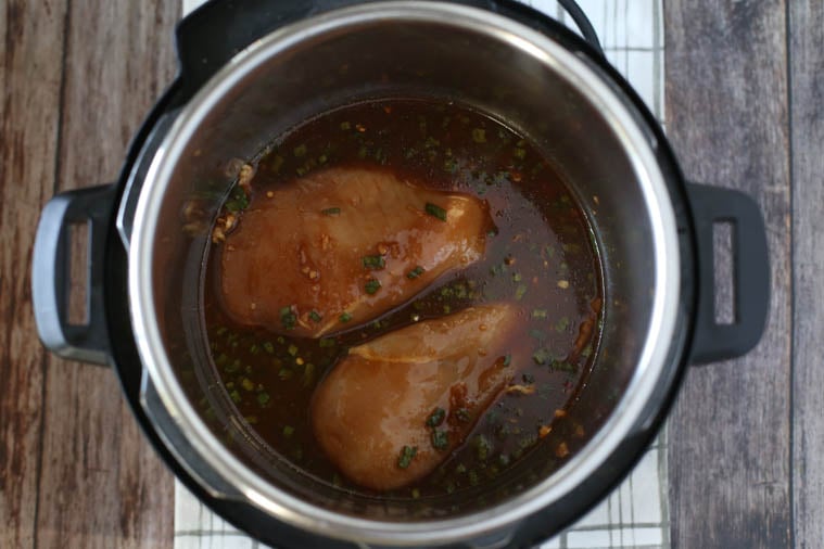 overhead shot of Chicken breast with sauce in the Instant Pot
