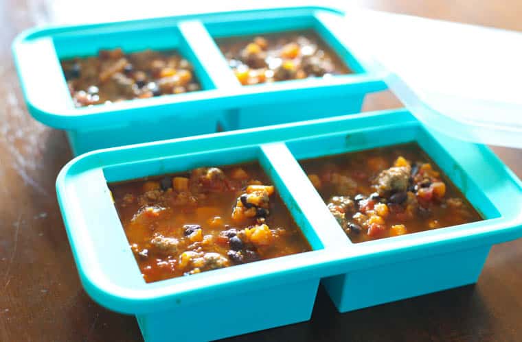 Blue 2-cup Souper Cubes filled with Turkey Chili ready to freeze.