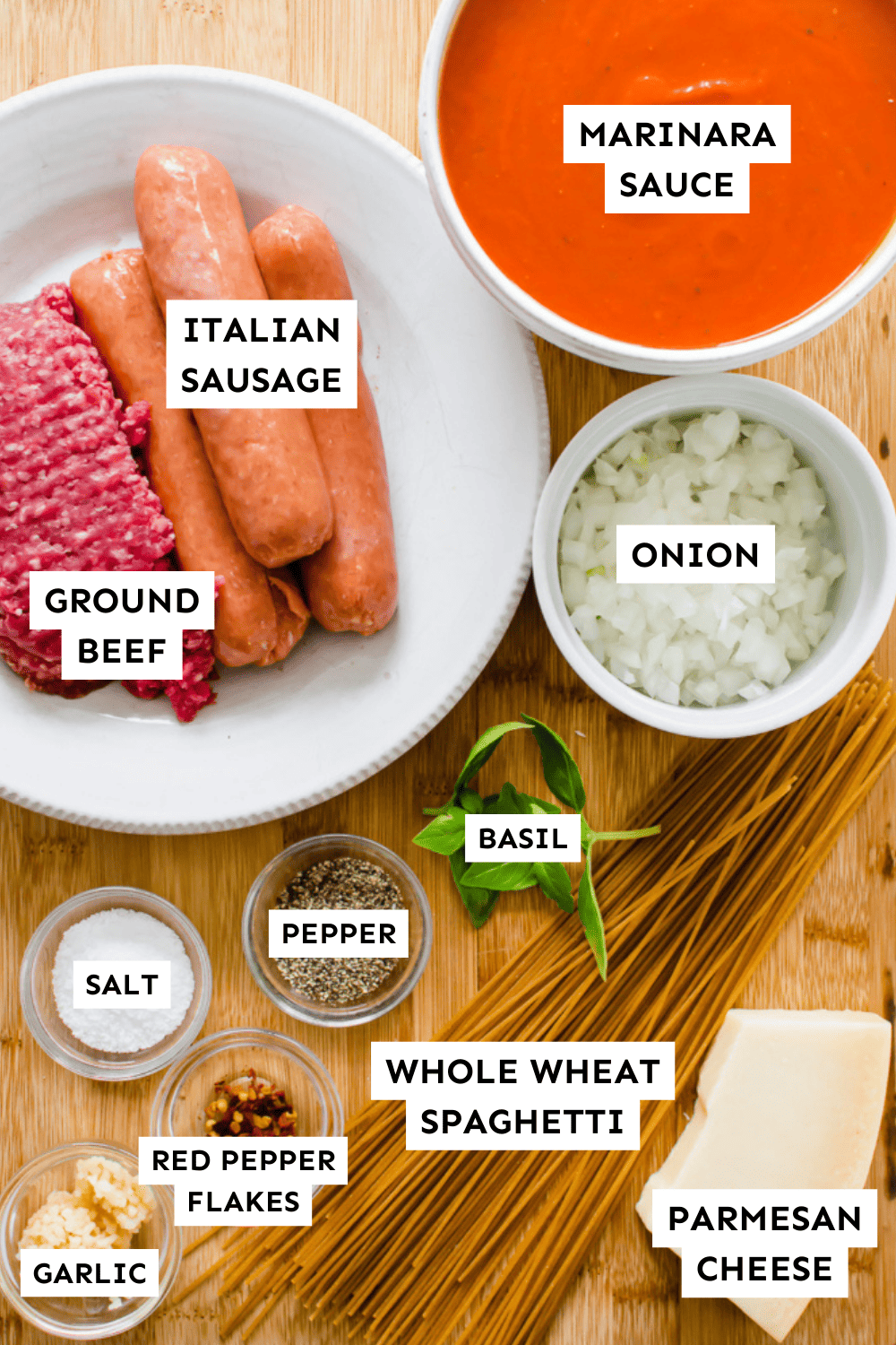 Ingredients for meaty marinara sauce measured out and labeled.
