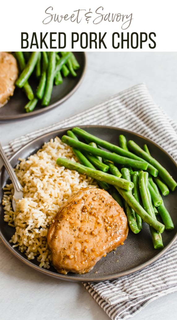 Oven baked boneless pork chop on a plate with green beans