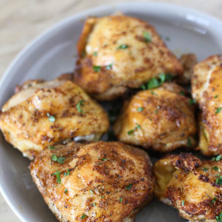Baked Italian Chicken thighs on a plate