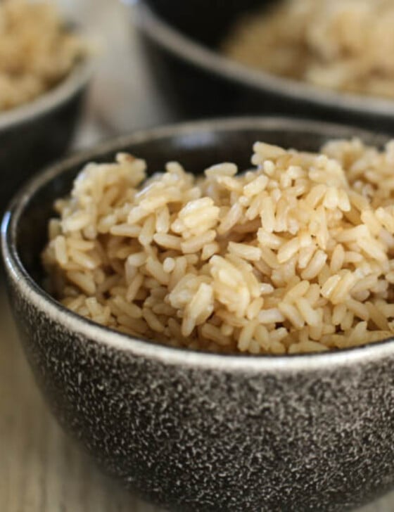 Cooked brown rice in a small bowl.